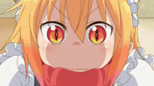 a close up of a girl 's face with red eyes .