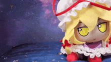 a stuffed doll with yellow eyes and a red hat