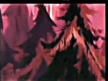 a painting of a woman 's face with a pink background