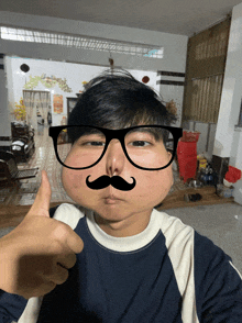 a young man wearing glasses and a fake mustache gives a thumbs up