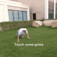 a man is crawling on the grass with the words touch some grass written below him