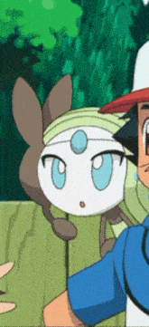 a cartoon character with a blue eye is being held by ash