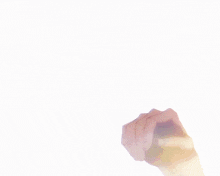 a close up of a person 's hands against a white backdrop