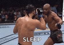 two men are fighting in a boxing ring with the words `` sleep '' written on the bottom .