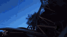 Twist And Turns Roller Coaster Ride At Dusk GIF - Twist And Turns Roller Coaster Ride At Dusk Upside Down GIFs