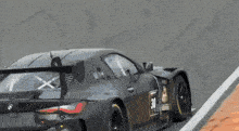 a race car with the number 30 on the back
