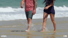 walking on the beach holding hands couple romantic mafs