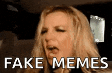 britney spears is making a funny face and saying `` fake memes '' in a car .