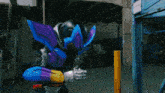 a man in a robot costume is holding two water guns in his hands