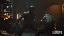 a poster for daredevil born again with two men fighting