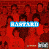 a group of children standing in front of a brick wall with bastard written on it