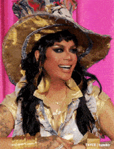 a woman wearing a cowboy hat and earrings is smiling in a photo taken by t4yce tumblr