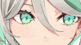 a close up of a person 's eyes with a white hair and green eyes