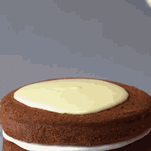a cake with white frosting on top of it