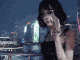 a woman wearing glasses is talking on a cell phone