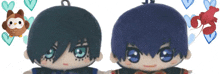 two stuffed animals with blue hair and blue eyes
