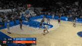 a basketball game between saint-quentin and le mans is underway