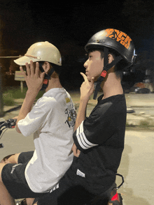 a man wearing a helmet that says sick you