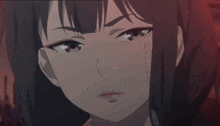 a close up of a anime girl 's face with a serious look on her face