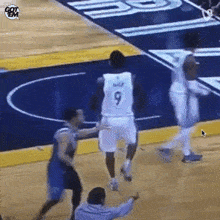 a basketball player with the number 9 on his back