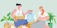 a woman is sitting at a table with a box of clothes and a t-shirt .