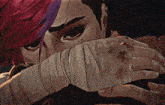 a man and a woman are hugging and the woman has a tattoo on her face that says vii