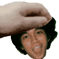a close up of a person 's face with a hand holding it