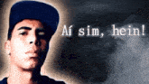 a man wearing a hat with the words ai sim hein written on it