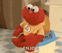 elmo from sesame street is sitting on a potty and saying `` enjoy '' .