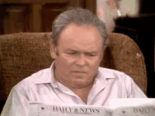 Reading Newspaper All In The Family GIF - Reading Newspaper All In The Family Archie Bunker GIFs
