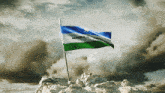 republic of somalia flag on top of a rock