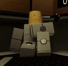 a robot with a wooden head is sitting on a keyboard with the letter o in the background