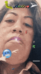 a close up of a woman 's face with the word amore in the upper right corner