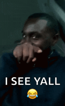 a man covering his mouth with his hand and the words " i see yall " above him