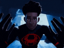 a man with a red hand reaching out towards him