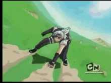 a cartoon network advertisement with a cartoon character on a hill