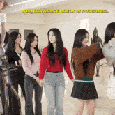 a group of girls are holding hands with the words yooyeon dance break in progress below them