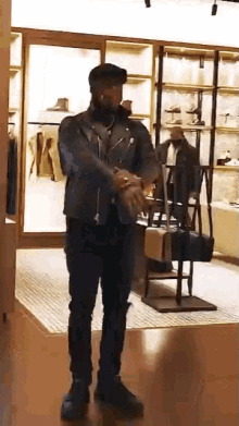 Trying On New Coat Nigel Sylvester GIF - Trying On New Coat Nigel Sylvester Dress Up GIFs