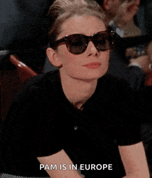 a woman wearing sunglasses with the words pam is in europe written below her