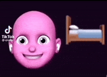 a pink baby 's head with a bed in the background .