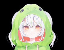 a girl with white hair is wearing a green frog hood