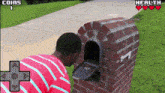 a man is looking into a mailbox with coins and health icons