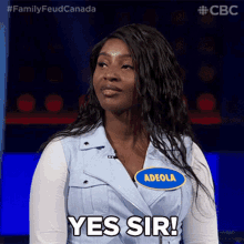a woman with a name tag that says " yes sir "