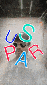 a man wearing sunglasses has the letters us par surrounding him