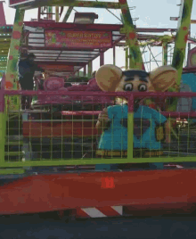 a roller coaster with a sign that says super rotor on it