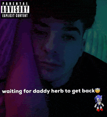 a picture of a young man with a parental advisory label on it