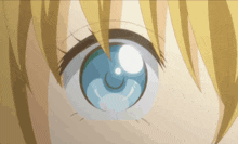 a close up of a anime girl 's blue eye