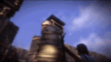a blurred image of a person standing in front of a building