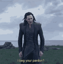 a man standing in a field with the words i beg your pardon