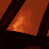 a close up of a fire through a window